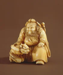 Netsuke in Form eines Dämonenbezwingers und eines kleinen Dämons, Meiji-Periode (1868-1912)